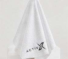 ACTIVX Bath Towel in White — hanging view