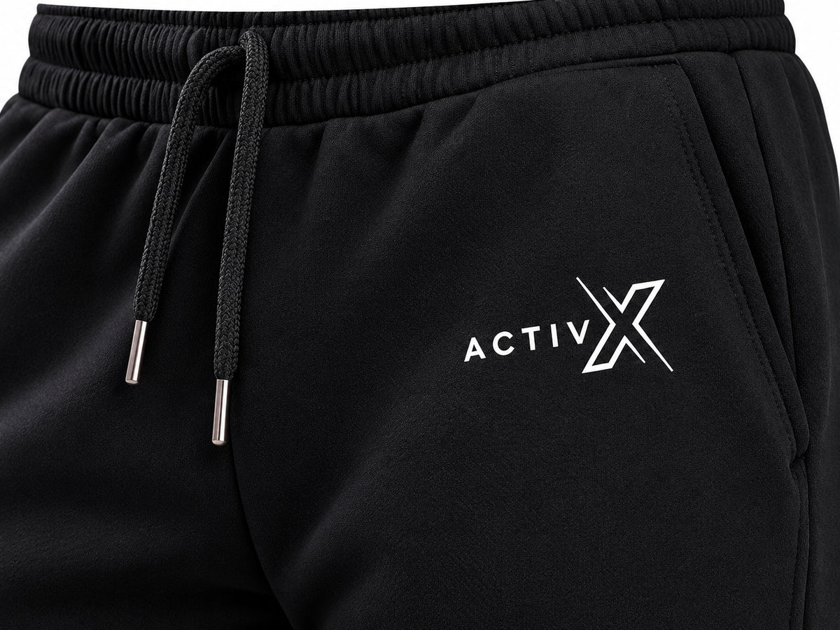 ACTIVX Men's Fleece Joggers in Black — waistband and logo detail